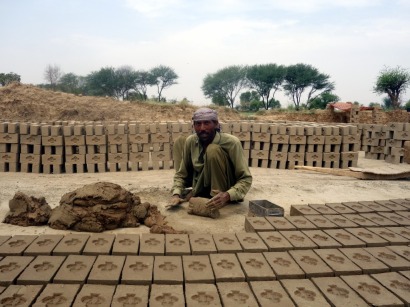 Worker in the brick kiln near Lahore, Pakistan